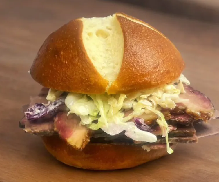 Mixed grilled meat lamb ribs chicken potato side view